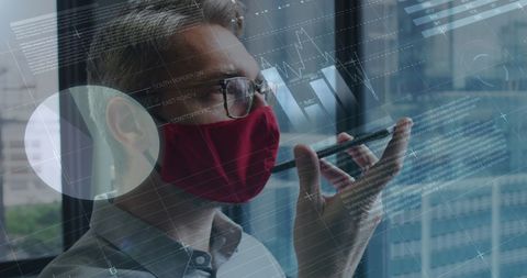 Businessman Analyzing Data with Smartphone During Pandemic