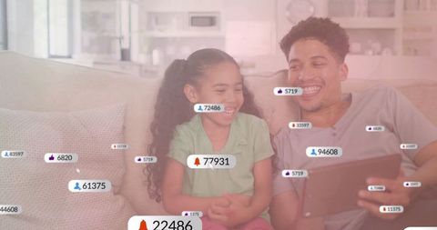 Father and Daughter Engaging with Tablet in Cozy Living Room