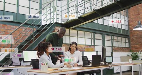 Coworkers Analyzing Documents in Industrial Loft Office