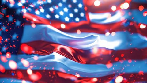 Waving american flag with vibrant red and blue bokeh