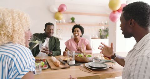 Joyful Gathering Friends Enjoying Lunch at Home