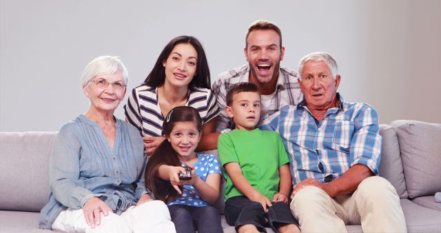 Smiling Multigenerational Family Relaxing on Couch - Download Free Stock Images Pikwizard.com