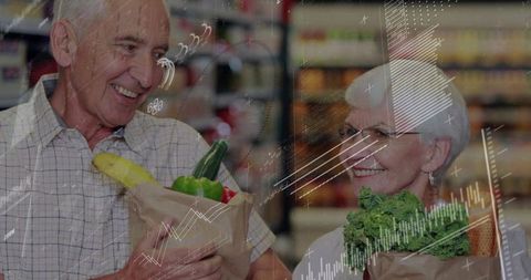 Senior couple shopping carrying fresh produce bags sharing smiles, warm companionship
