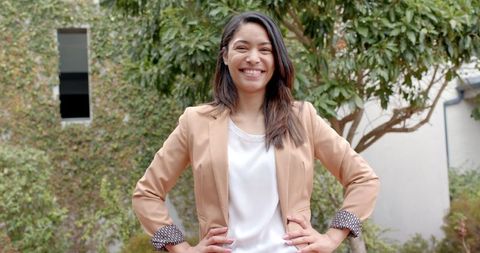 Confident young professional woman in outdoor setting