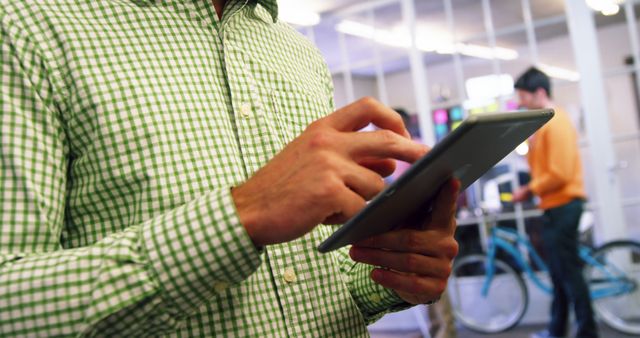 Office Worker Using Digital Tablet in Modern Workspace - Download Free Stock Images Pikwizard.com