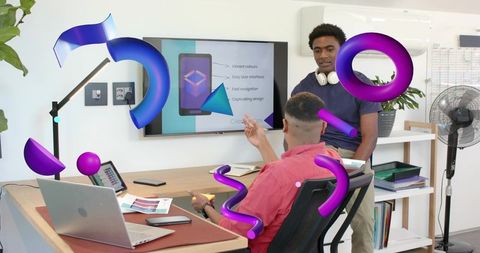 Presenting mobile app mockup with ar overlays during creative office collaboration