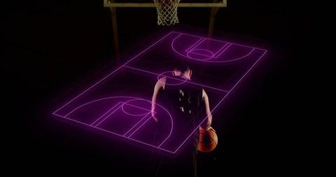 Basketball player holding ball under hoop with neon holographic court and silhouette glow