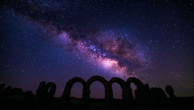 Milky Way Galaxy Over Desert Ruins at Night