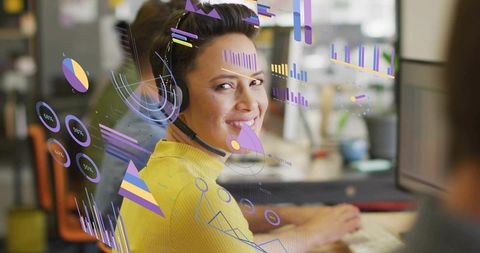 Smiling support agent with digital charts in modern office