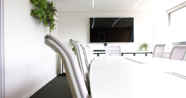 Modern Meeting Room with Large Screen and Office Chairs - Download Free Stock Images Pikwizard.com