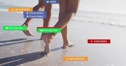 Couple enjoying serene barefoot walk on beach with social media overlay icons