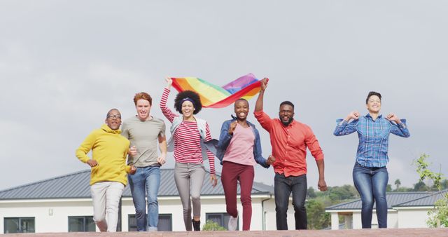 Diverse Group of Friends Celebrating with Pride Flag Outdoors - Download Free Stock Images Pikwizard.com