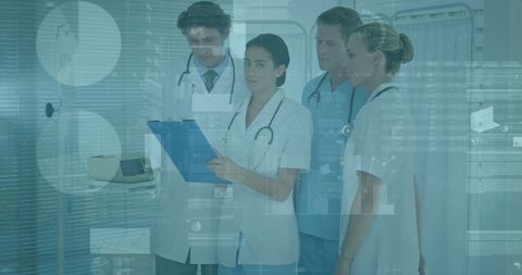 Medical Team Analyzing Data Exchanges in Modern Hospital