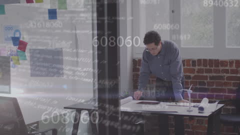 Tech-Savvy Businessman Analyzing Data in Modern Office