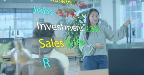 Businesswoman Analyzing Financial Data on Transparent Board - Download Free Stock Images Pikwizard.com