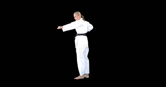 Female Martial Artist Performing Karate Punch - Download Free Stock Images Pikwizard.com