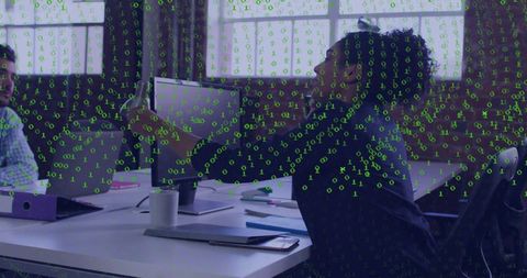 Office teamwork exchanging tablet with green binary code overlay representing digital collaboration