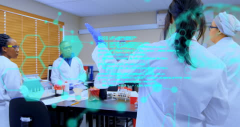 Diverse Scientists Analyzing Data in Hi-Tech Laboratory