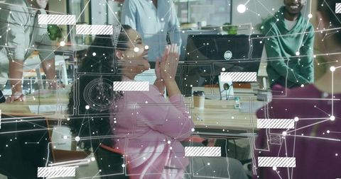 Celebrating Success in Modern Office with Digital Overlay