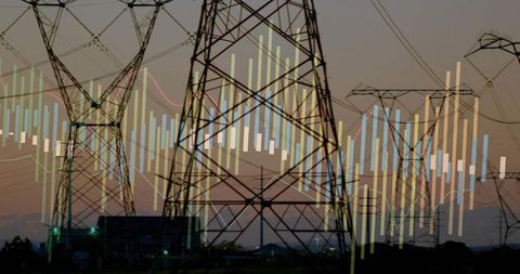 Industrial power lines with energy data overlay at dusk