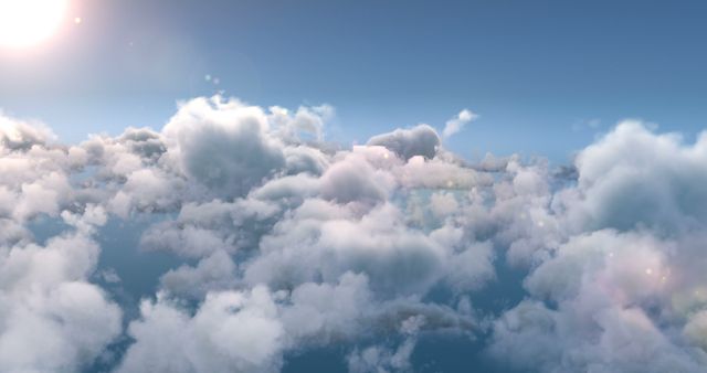 Fluffy white clouds fill the sky, creating a serene and dreamy atmosphere, with copy space. Ideal for backgrounds or themes related to weather, tranquility, or the beauty of nature.