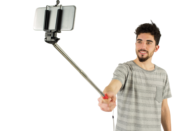 Transparent casual young man taking selfie with selfie stick studio shot - Download Free Stock Videos Pikwizard.com