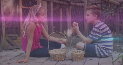 Siblings Gathering Eggs on Farm during National Siblings Day