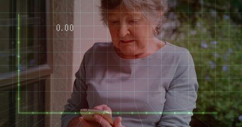 Senior woman scrolling smartphone on covered porch with digital hud overlay