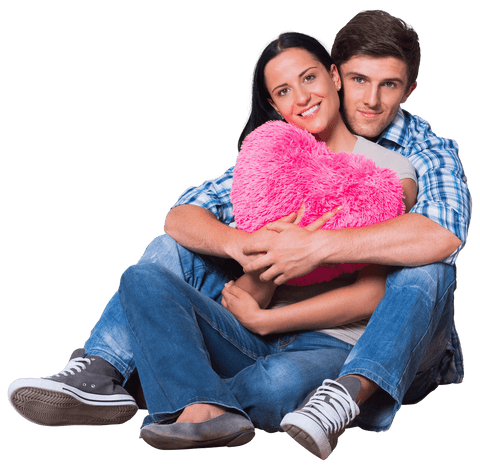 Happy Couple Embracing with Pink Heart Pillow on Transparent Background