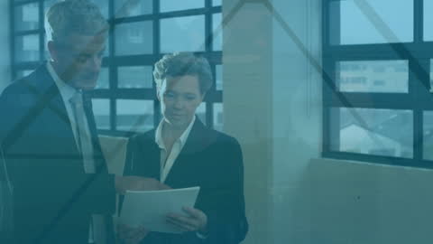 Diverse Business Professionals Analyzing Tablet with Financial Data Visualization