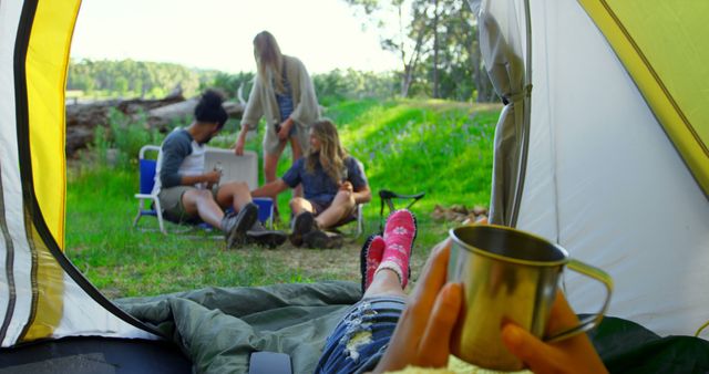 Group of Friends Relaxing at Campsite During Sunny Day - Download Free Stock Images Pikwizard.com