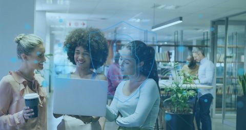 Diverse Professionals Discussing Cybersecurity in Modern Office