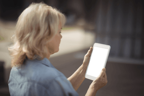 Senior Woman Engaging with Digital Tablet on Sunny Day - Download Free Stock Videos Pikwizard.com