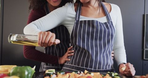 Couple Cooking Together in Kitchen with Vegetables - Download Free Stock Images Pikwizard.com