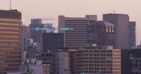 Urban Skyline with Reflective Skyscrapers at Sunset