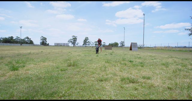 Police Dog Training on Open Field Under Clear Sky - Download Free Stock Images Pikwizard.com