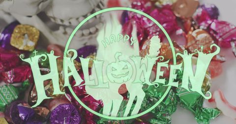 Happy Halloween Banner with Candies and Pumpkin Design