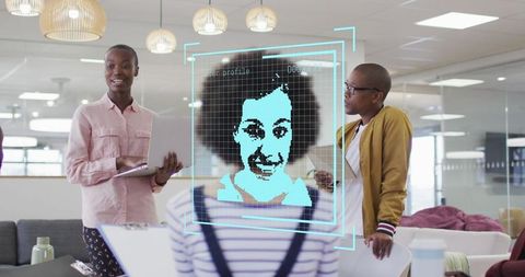 Diverse Team in Modern Office with Facial Recognition Interface