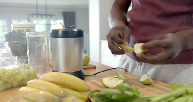 Person Preparing Fresh Ingredients for Healthy Smoothie in Modern Kitchen - Download Free Stock Images Pikwizard.com