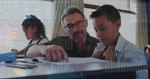 Teacher Assisting Students Amidst Financial Data Graph Overlay - Download Free Stock Images Pikwizard.com