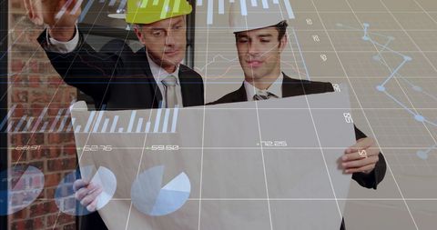 Architects Analyzing Plans with Financial Data Projections - Download Free Stock Images Pikwizard.com