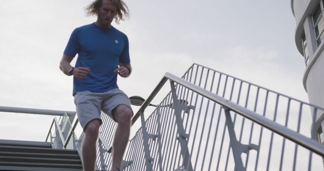 Fit Man Running Up Outdoor Staircase for Cardio Exercise - Download Free Stock Images Pikwizard.com