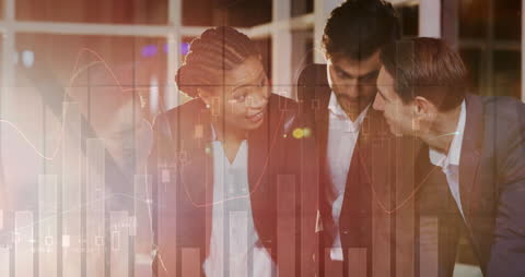 Diverse Business Team Analyzing Financial Data While Collaborating