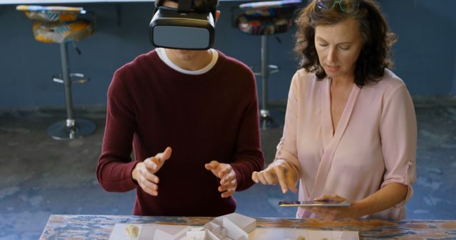 Architects Using Virtual Reality Headset And Tablet Working On Building Model - Download Free Stock Images Pikwizard.com