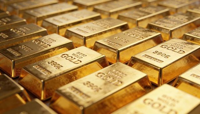 Shiny gold bars stacked in vault reflecting light, bullion ingots displaying wealth