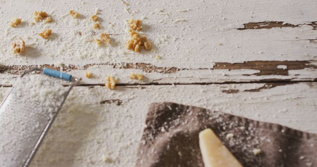 Scattered Parmesan Cheese and Walnuts on Rustic Wooden Table - Download Free Stock Images Pikwizard.com