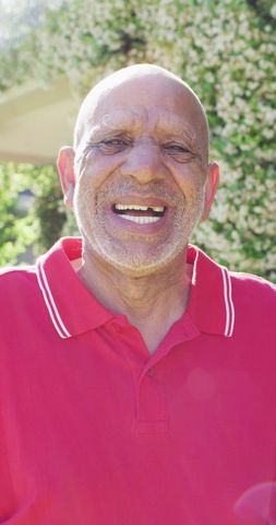 Elderly Man Joyfully Laughing in Sunny Garden - Download Free Stock Images Pikwizard.com