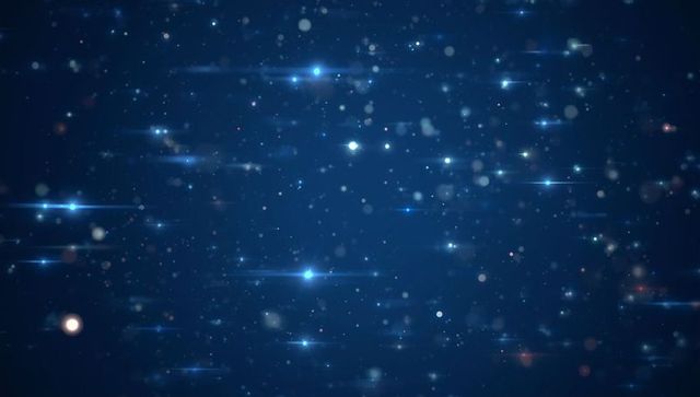 Shimmering stars against deep blue cosmic expanse