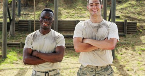 Two Confident Soldiers Showcasing Teamwork in Training Environment - Download Free Stock Images Pikwizard.com