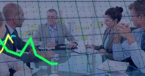 Executive team discussing performance trends with green line chart overlay during meeting